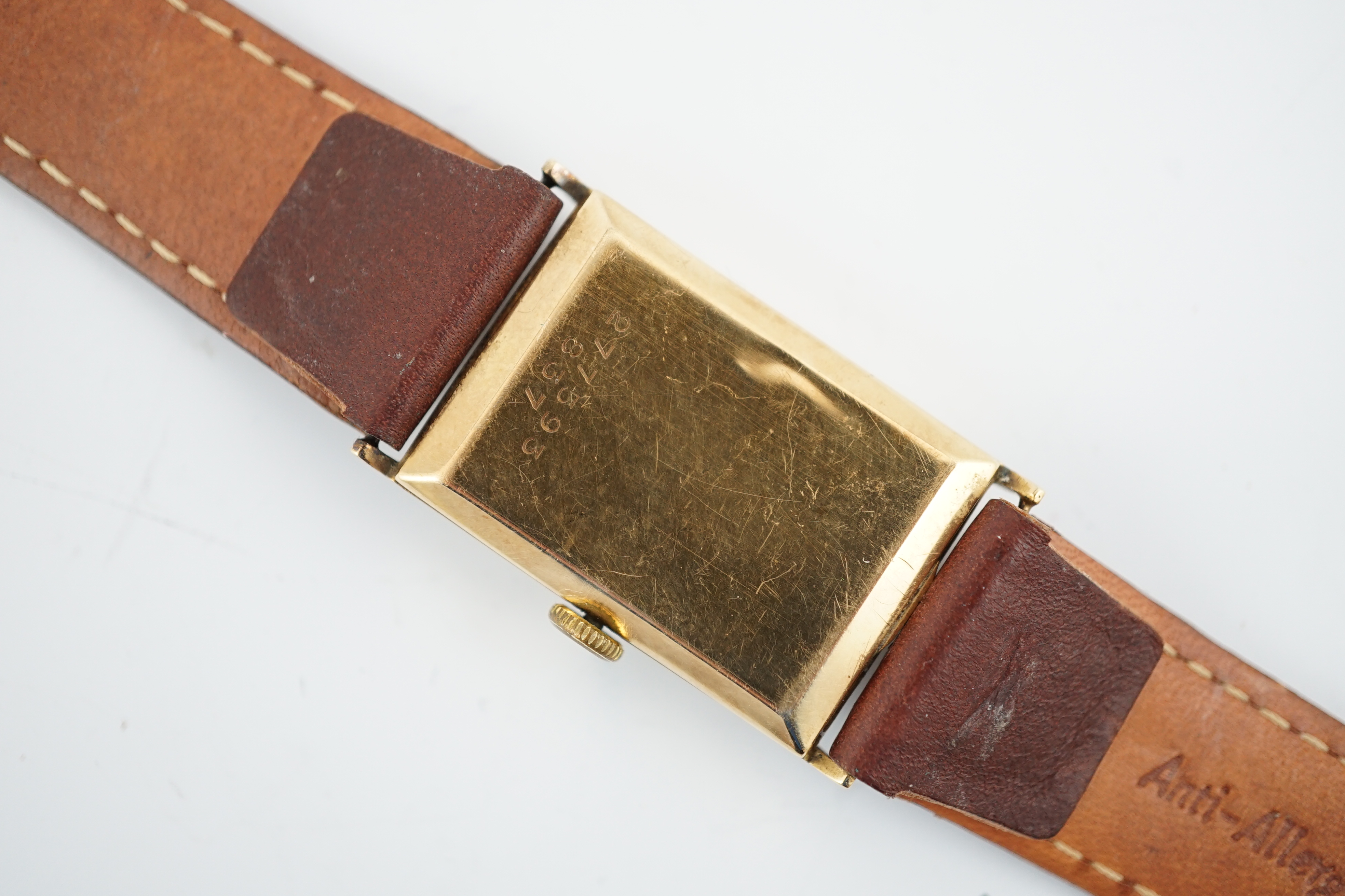 A gentleman's 1950's? 14k gold Tudor manual wind rectangular dial wrist watch